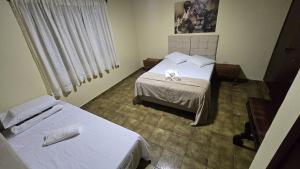 Quartos Refúgio com Vista e Piscina Compartilhada