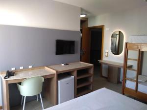 Cama em quarto quadruplo Réveillon Balneário Camboriú pacote 7 dias com café incluso preço unico promoção