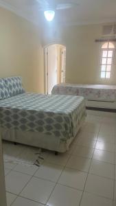 Casa de praia em Peruibe com muito verde!