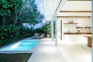 Stylish 2BR Villa, 5min to Bingins Beach Bliss