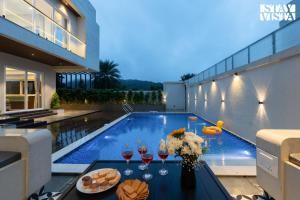 Amara Palms by StayVista - 4BHK Villa with Private Pool & Terrace