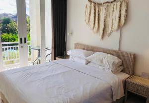 The Renon Residence King Bedroom 203