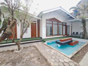 Urbanview Bimo Homestay near Sindu Kusuma Edupark Yogyakarta - 3hvězdičkové hotely ve městě Jetis