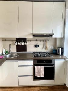 Bright and cozy apartment in the city center with balcony