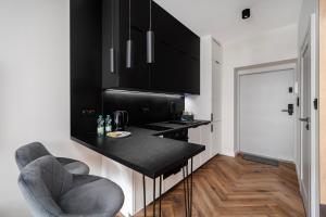 Piotrkowska Grand Avenue Apartments by BookingHost