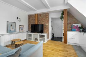 Charming Apartment in a Perfect Location Suitable for 4 People by Noclegi Renters