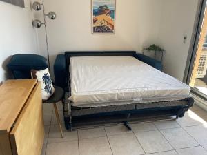Joli T2 climatisé avec terrasse et piscine, Wifi