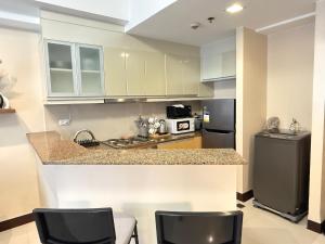 Panoramic Views 2BR Family Stay in Mckinley BGC