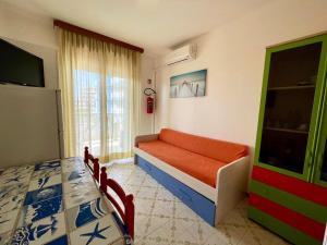 Colorful studio with shared pool