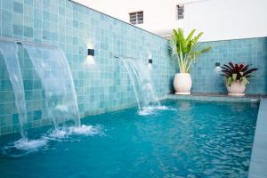 Studio Design com Piscina e Terraço no Centro