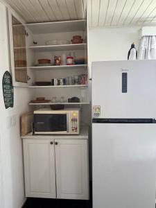 Estúdio casa condomínio Carasol