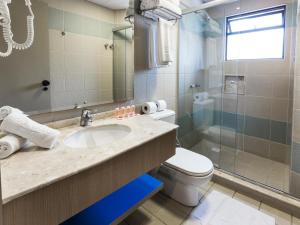 Cama em quarto pacote 7 dias Réveillon Balneário Camboriú com café incluso