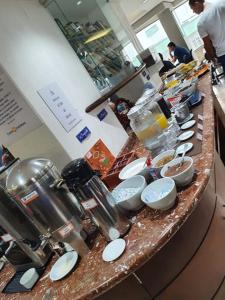 Cama em quarto pacote 7 dias Réveillon Balneário Camboriú com café incluso