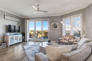 Enjoy Oceanfront Luxury and Magical Sunrises at this 2-bedroom 2-bath condo