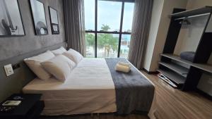 Estadia completa em prédio com piscina a 850m da praia em Florianópolis - STIs