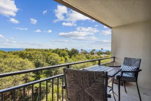 3 bedroom, 3 bathroom, end unit on the 2nd floor with an outdoor community pool