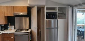 MOBIL HOME DE GRAND CONFORT-3ch Climatisées-CAMPING BONNE ANSE 509- 4 étoiles LA PALMYRE