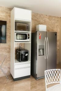 A Casa Paradisiaca ll Luxo Piscina Super Quente até 50 graus de Temperatura Aquecimento Elétrico com Sauna, ofurô Quente e Lavanderia com Roupa de Cama e Aceitamos PET , Temos Lareira e Temos ponto para Recarga de carro Elétrico, Com Valores Adic