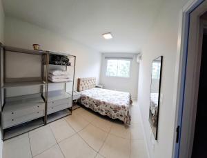 Apartamento novo, 2 quartos a 50 metros da praia