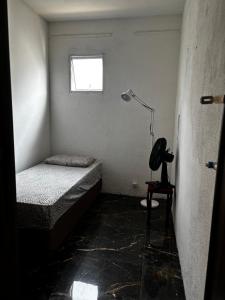 Quarto janelinha barão geraldo