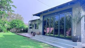 Modern Retreat with Stylish Interiors & Peaceful Garden View