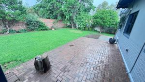 Modern Retreat with Stylish Interiors & Peaceful Garden View