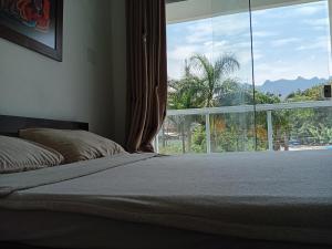 Casa com Ar Condicionado e Wifi 5G no Parque Mambucaba Na entrada do bairro