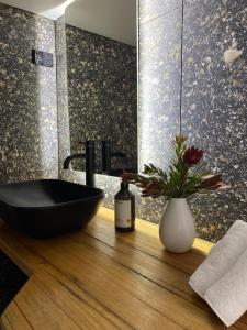 Bold and Vibrant with large bathtub and rain shower