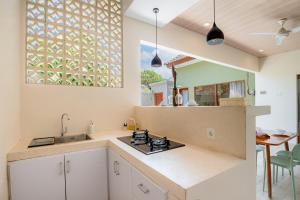 KIKI VILLAGE BATHTUB AND LIVING ROOM