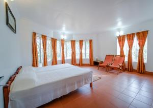 Viriparai Tea Bungalow Munnar by VOYE HOMES - Surrounded by Tea Plantations