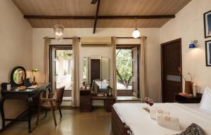 SaffronStays Bay Watch - 3BR beachfront pool villa with bonfire, gazebo & coconut grove lawns along Kelwa shoreline