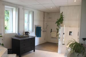 B&B Even Heukelom - Kamer met Tuin
