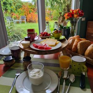 B&B Even Heukelom - Kamer met Tuin