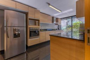 Capitalia Chic 1BR w High-Speed