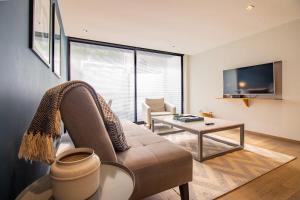 Capitalia Chic 1BR Comfort in Prime Location