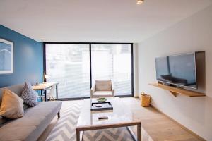 Capitalia Chic 1BR Comfort in Prime Location