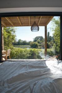 EXCLUSIVITE Lodge haut de gamme avec bain nordique privatif au bord du canal à 1h15 de Paris