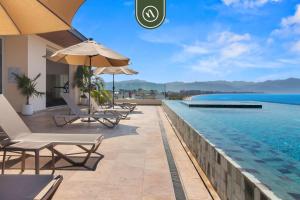 New Stylish 1 BR Condo - Ocean Views - Flex Room