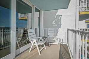 New listing! Direct oceanfront condo with a balcony, heated pool, and tennis court