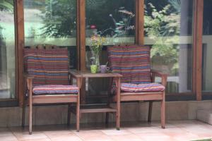 B&B Even Heukelom - Kamer met Tuin