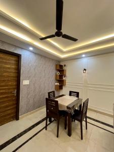 2bhk luxury White lotus apartment by madanan