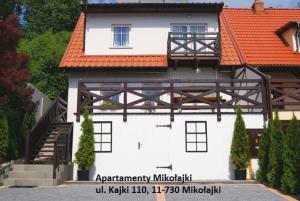 Apartamenty i pokoje Mikołajki