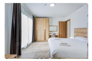 Peaceful 2BR Seaside Penthouse - by HostMT