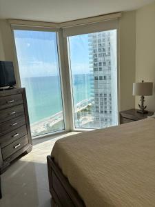 Luxurious 2BD Condo with Direct Ocean Views & Resort Pool in Sunny Isles