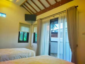 AUREIRIN Guesthouse - 4hvězdičkové hotely ve městě Banyuwangi