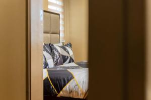 Atman Suite 2 BR Fort Victoria BGC Taguig