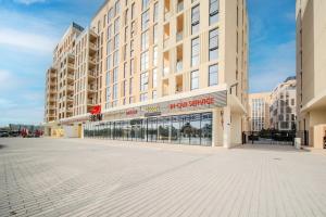 1BR Apartment With Living Room - Poolview - Alef Al Mamsha