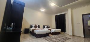 الرموز الصادقة للشقق المخدومة Apartments alrumuz alsadiqah