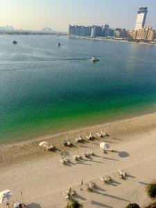 Beachfront Luxe 1BR Grand Bleu with Private Beach & Sea View