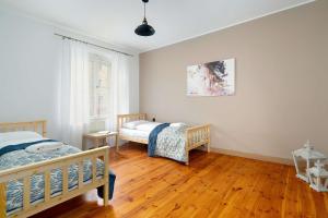 Family Apartment with a Remote Work Space in Poznań by Noclegi Renters